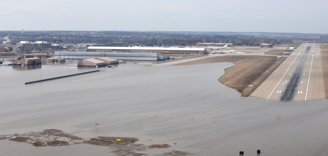 Midwest flood showing an airport runway partially under water